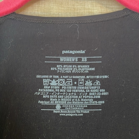 Patagonia Twist Front Dress 
XS 
36” Total Length 
Stretchy, wicking fabric - Picture 3 of 5